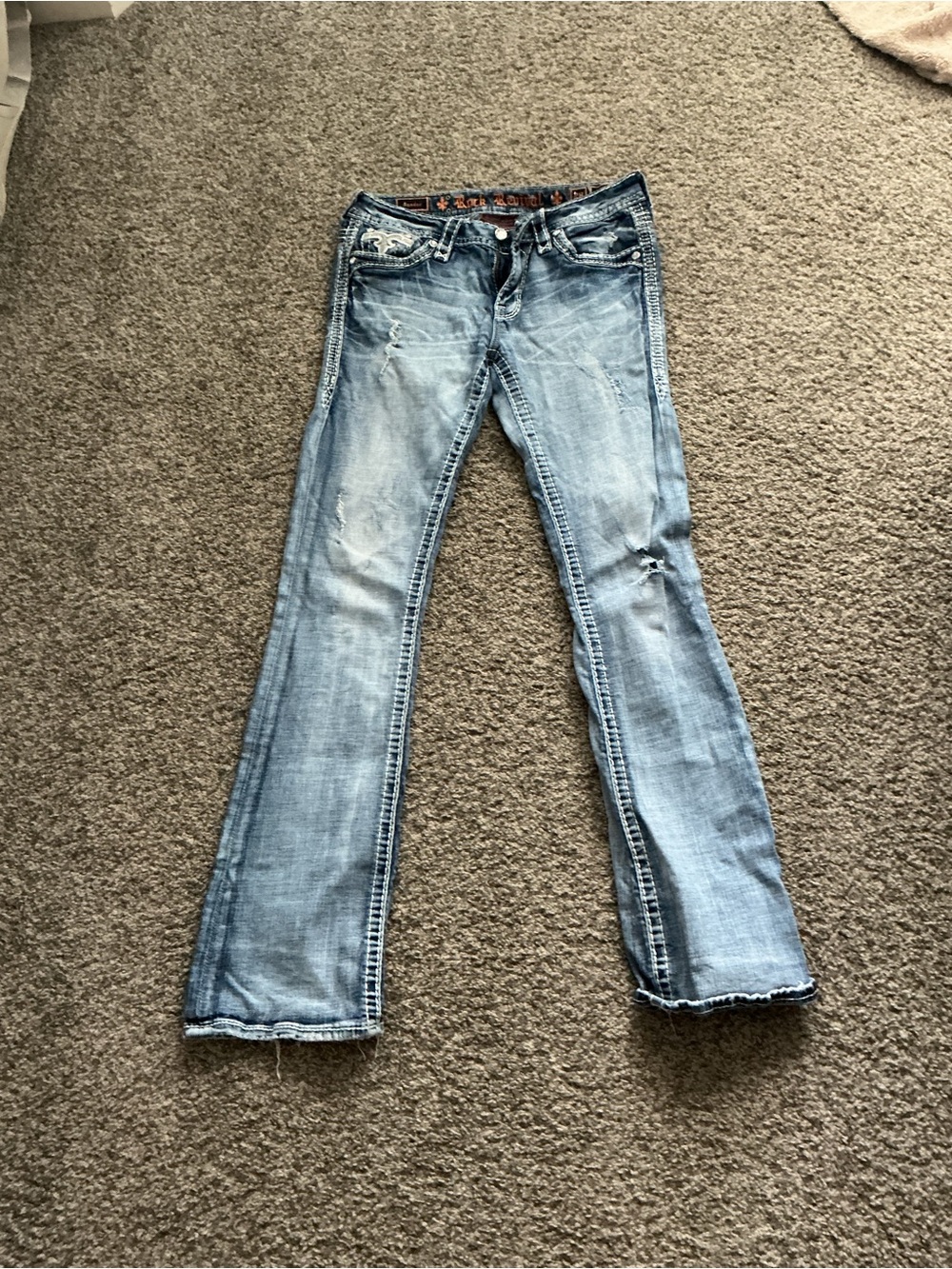 Rock Revival Light Blue Flared Jeans with Subtle Distress